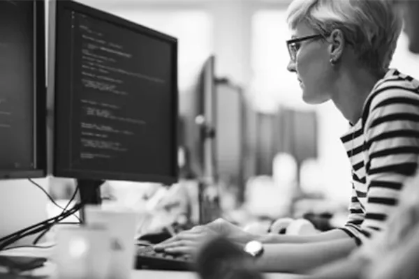 woman looking at a monitor
