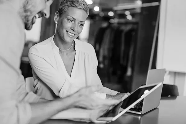 woman looking at a tablet