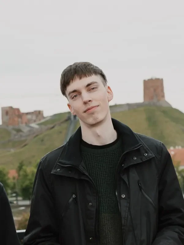 Image of Deividas Jagela with a hill in the background