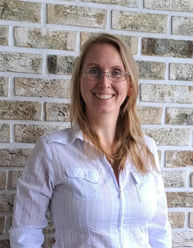 Image of Egle Juraityte in front of a  brick background