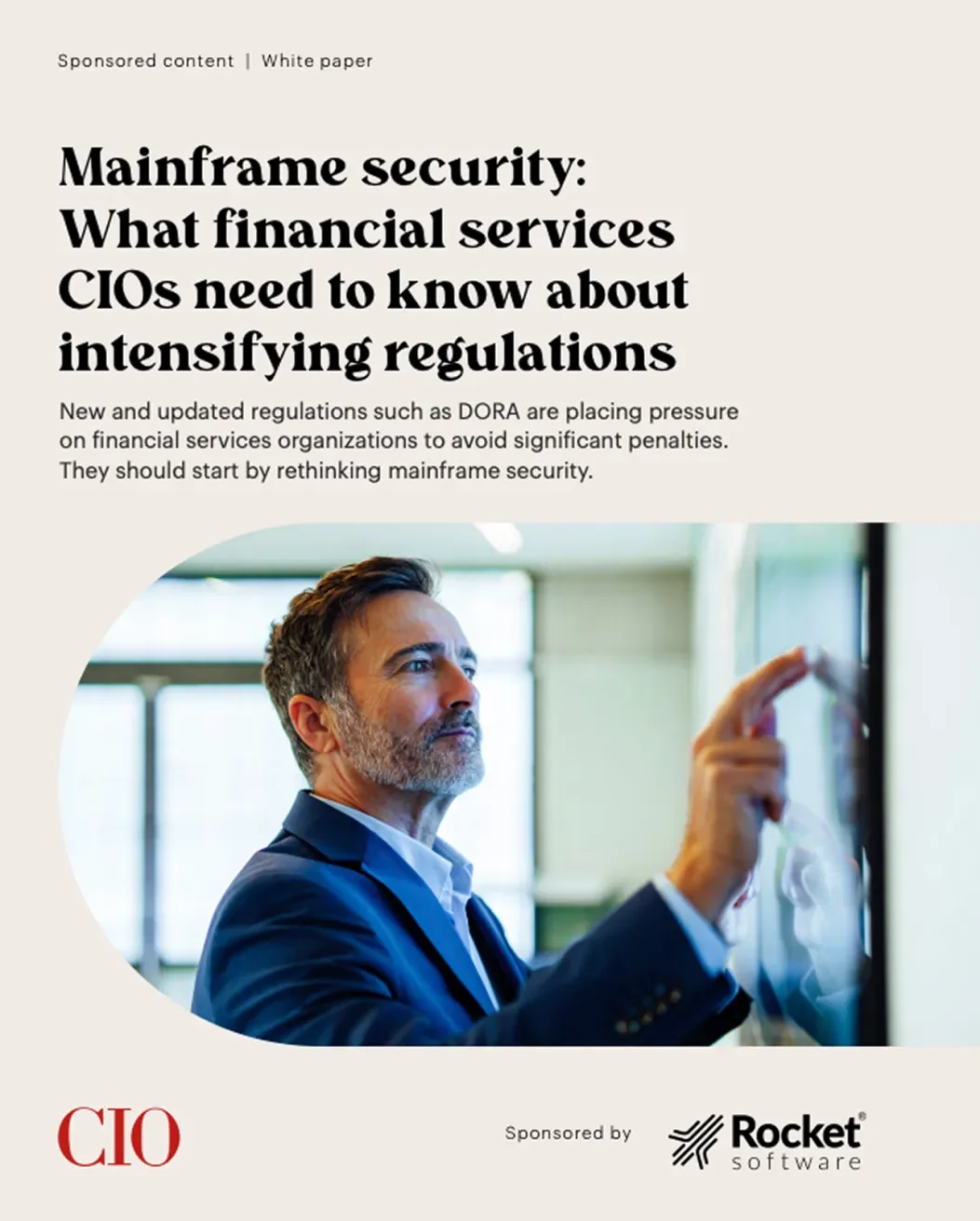 Cover image of the PDF titled ‘Mainframe security: What financial services CIOs need to know about intensifying regulations,’ featuring a man in a suit pointing.